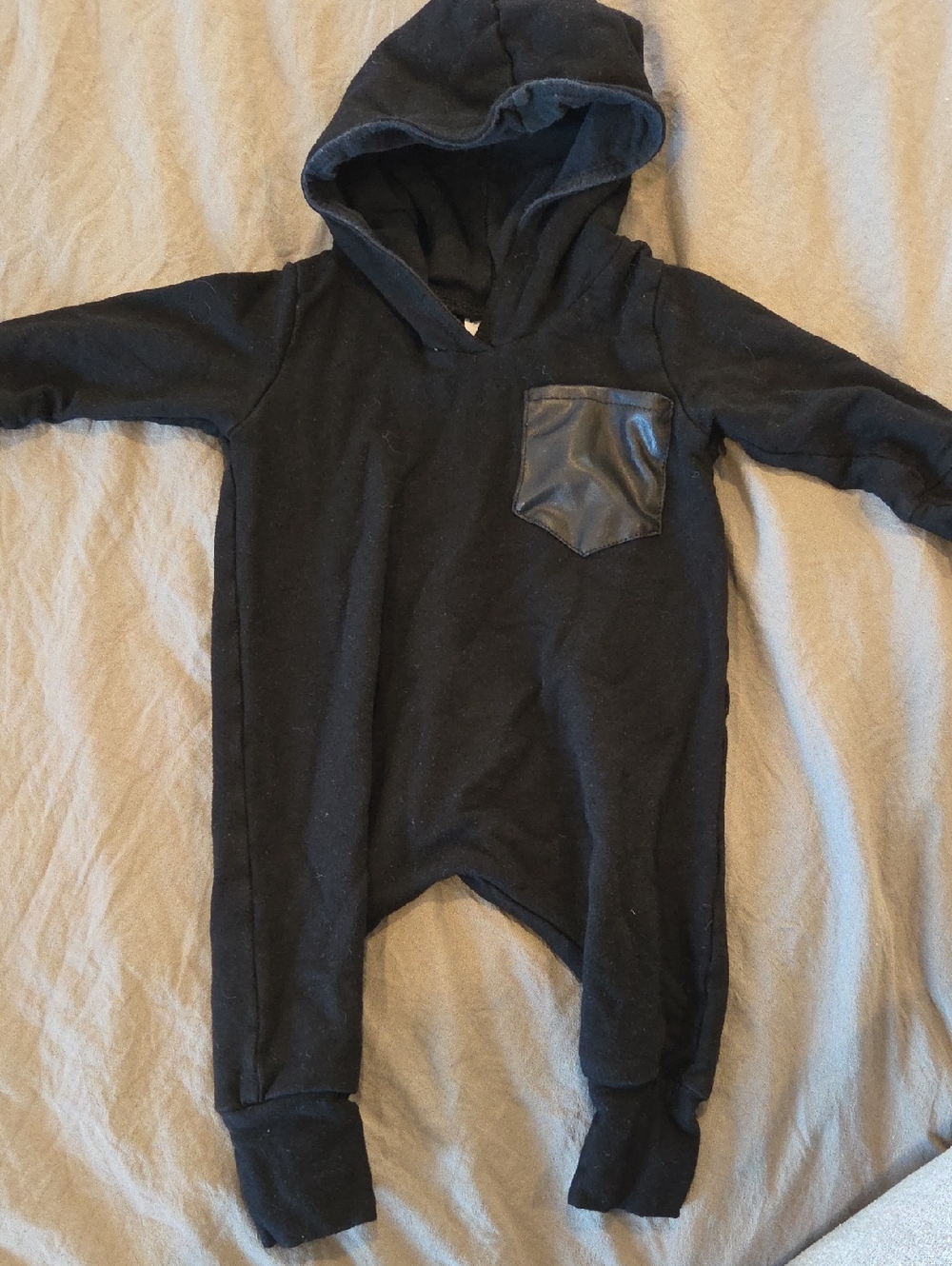 Black Hooded Baby One-Piece with Faux Leather Pocket